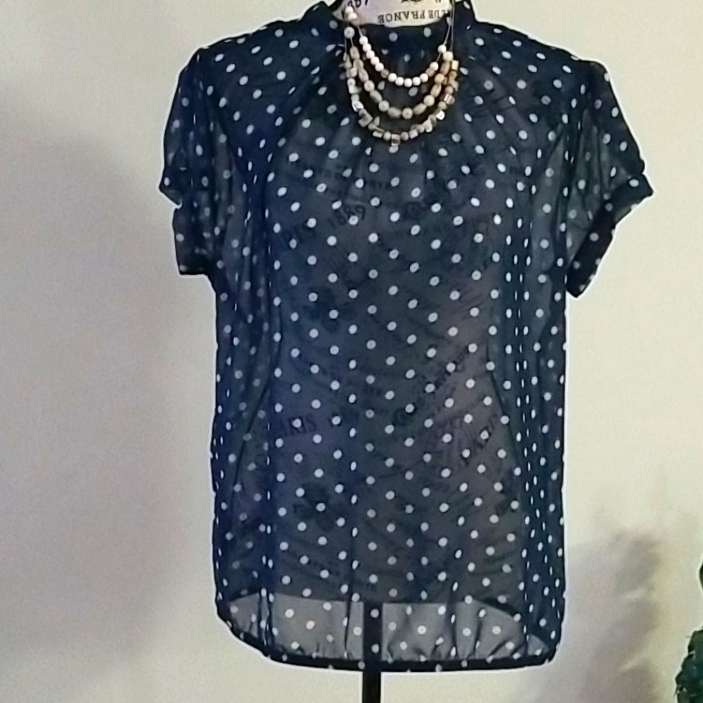 Dressy polka dot cap sleeve blouse